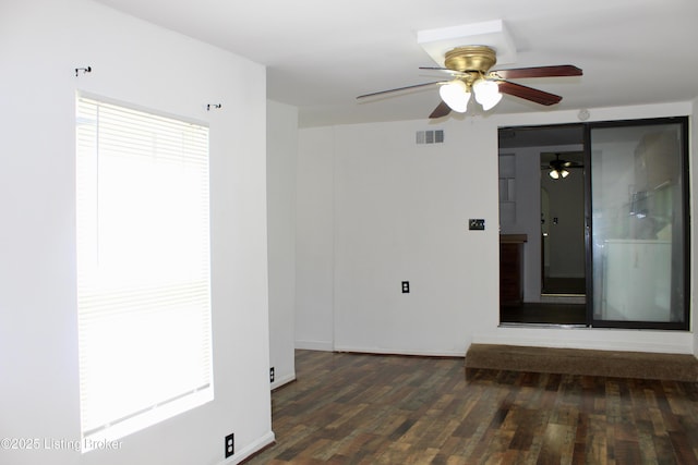 3023 Saint Dennis Ave, Louisville, KY 40216 - empty room with ceiling fan, baseboards, visible vents, and wood finished floors