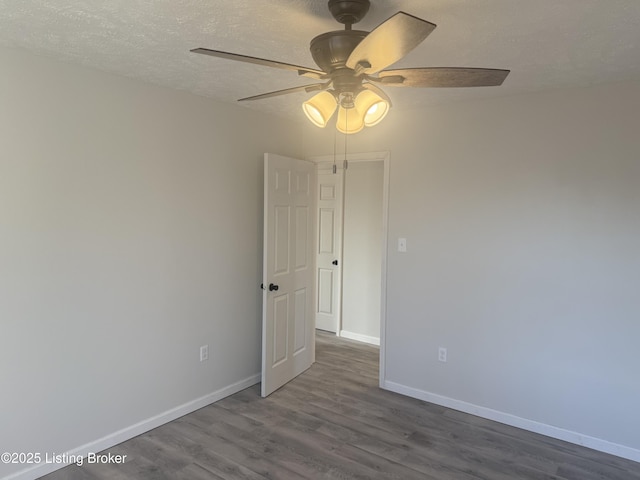 525 Leavette Ave, Leitchfield, KY 42754 - unfurnished room featuring wood finished floors, a ceiling fan, baseboards, and a textured ceiling