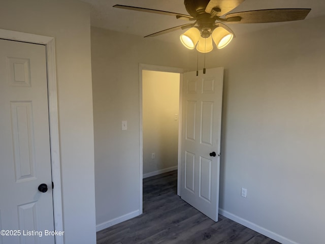 525 Leavette Ave, Leitchfield, KY 42754 - unfurnished bedroom featuring wood finished floors, baseboards, and a ceiling fan