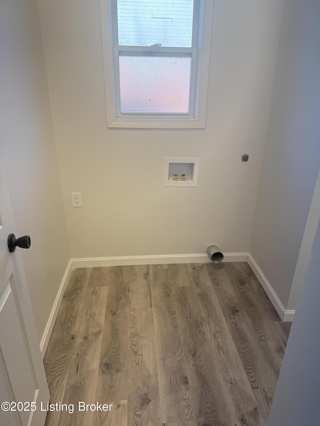 525 Leavette Ave, Leitchfield, KY 42754 - washroom featuring washer hookup, wood finished floors, baseboards, and hookup for an electric dryer