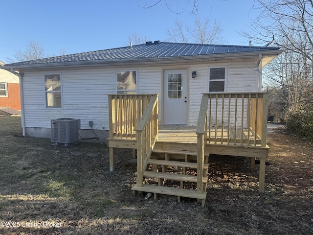 525 Leavette Ave, Leitchfield, KY 42754 - back of property featuring central air condition unit, a wooden deck, and metal roof