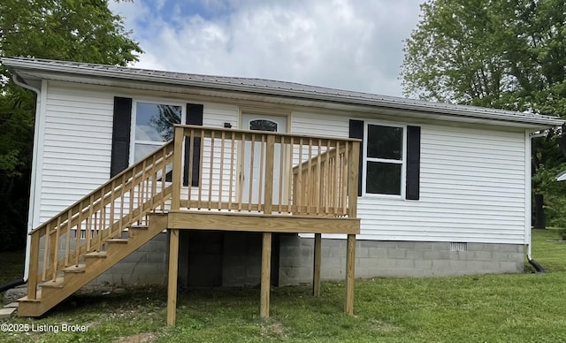525 Leavette Ave, Leitchfield, KY 42754 - rear view of property with a wooden deck, metal roof, a lawn, stairway, and crawl space