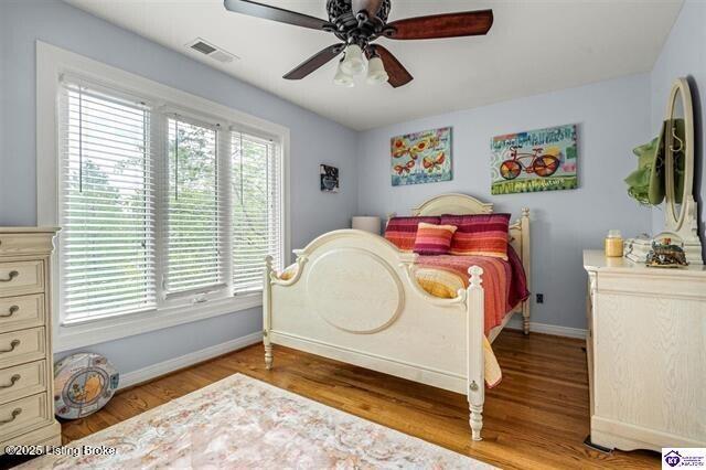 3507 Bridgegate Ct, Louisville, KY 40272 - bedroom with baseboards, wood finished floors, and ceiling fan