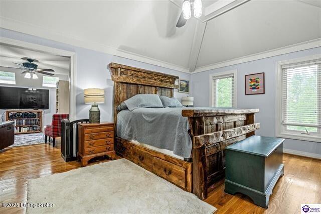 3507 Bridgegate Ct, Louisville, KY 40272 - bedroom featuring wood finished floors, vaulted ceiling, a ceiling fan, baseboards, and ornamental molding