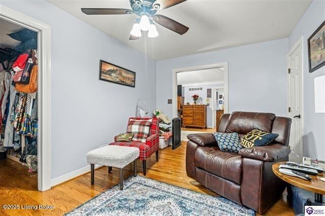 3507 Bridgegate Ct, Louisville, KY 40272 - sitting room featuring wood finished floors, ceiling fan, and baseboards
