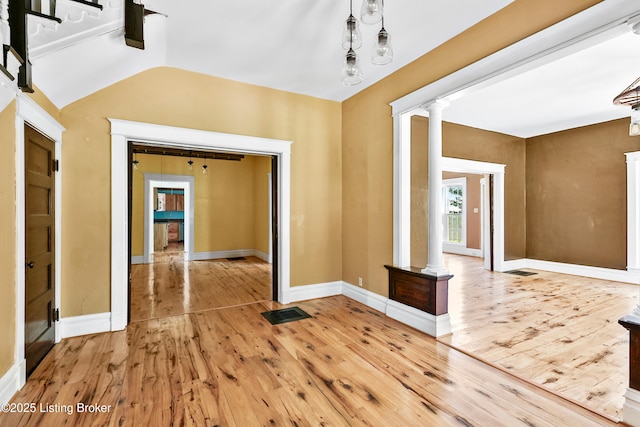 1836 Ellis Rd, Eminence, KY 40019 - foyer with decorative columns, light wood finished floors, baseboards, and lofted ceiling