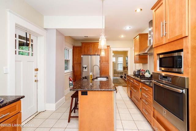 2104 Lauderdale Rd, Louisville, KY 40205 - kitchen with a sink, wall chimney range hood, dark stone countertops, light tile patterned floors, and appliances with stainless steel finishes