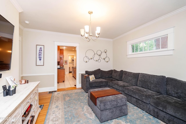 2104 Lauderdale Rd, Louisville, KY 40205 - living area with an inviting chandelier, ornamental molding, baseboards, and light wood-style floors
