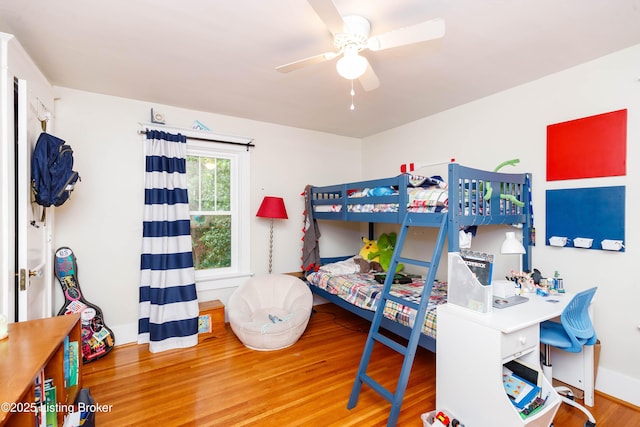 2104 Lauderdale Rd, Louisville, KY 40205 - bedroom with a ceiling fan, wood finished floors, and baseboards