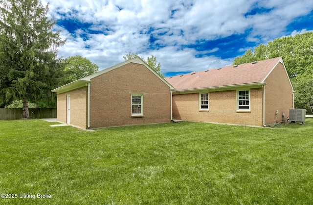 4002 Ciremos Ter, Louisville, KY 40241 - rear view of house with brick siding, central air condition unit, and roof with shingles