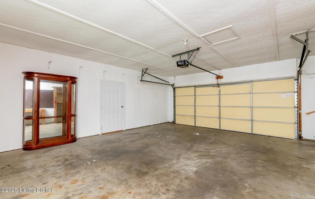 4002 Ciremos Ter, Louisville, KY 40241 - garage featuring a garage door opener