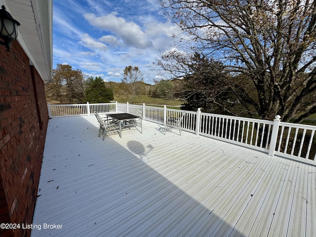 deck with outdoor dining space