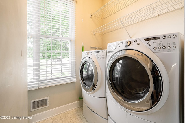 13216 Willow Forest Dr, Louisville, KY 40245 - washroom featuring independent washer and dryer, baseboards, and light tile patterned floors