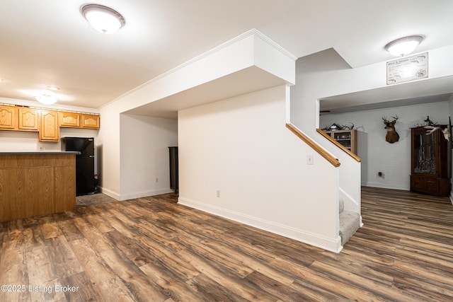 13216 Willow Forest Dr, Louisville, KY 40245 - kitchen with freestanding refrigerator, dark wood-style floors, baseboards, and light brown cabinets