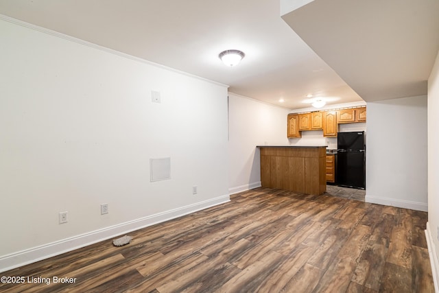13216 Willow Forest Dr, Louisville, KY 40245 - kitchen with freestanding refrigerator, a peninsula, dark wood-style floors, baseboards, and crown molding