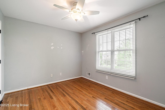 13216 Willow Forest Dr, Louisville, KY 40245 - spare room featuring wood finished floors, baseboards, and a ceiling fan