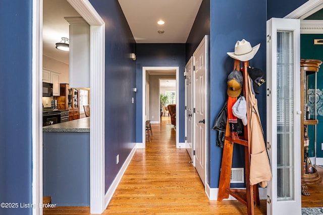13216 Willow Forest Dr, Louisville, KY 40245 - corridor featuring light wood finished floors, baseboards, and recessed lighting
