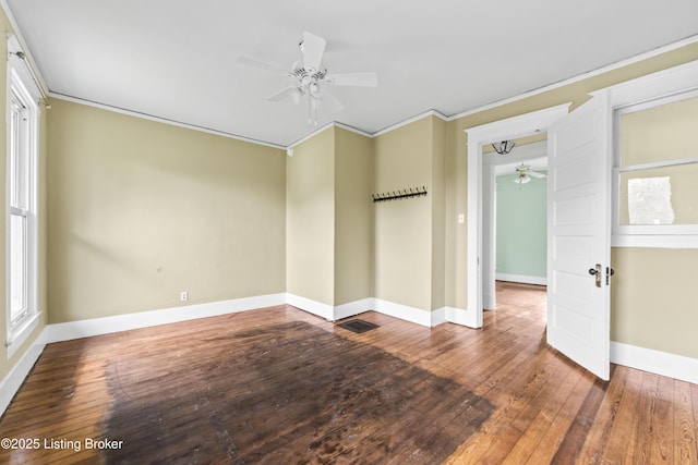 1412 Bluegrass Ave, Louisville, KY 40215 - empty room with a ceiling fan, baseboards, crown molding, and hardwood / wood-style flooring
