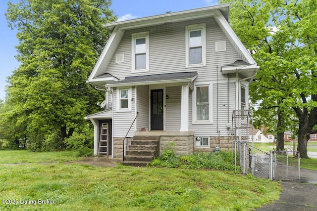 1412 Bluegrass Ave, Louisville, KY 40215 - colonial inspired home featuring a gate, fence, and a front yard