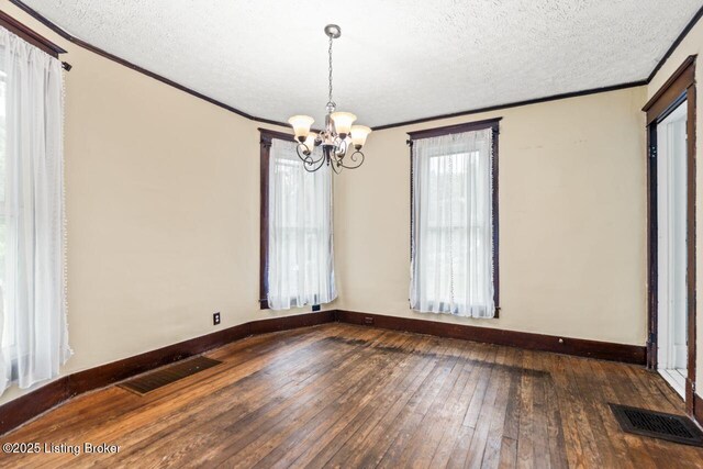 1412 Bluegrass Ave, Louisville, KY 40215 - unfurnished room with an inviting chandelier, visible vents, wood-type flooring, and crown molding