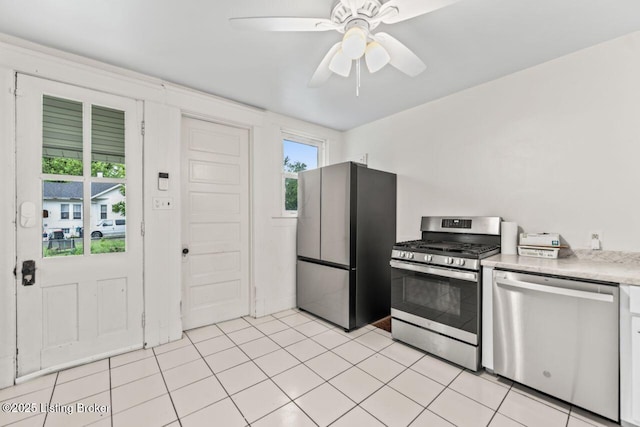 1412 Bluegrass Ave, Louisville, KY 40215 - kitchen with a ceiling fan and appliances with stainless steel finishes