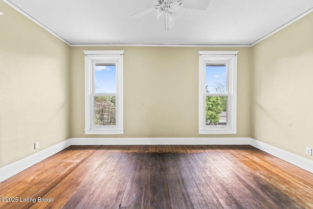 1412 Bluegrass Ave, Louisville, KY 40215 - empty room with ornamental molding, wood-type flooring, baseboards, and a healthy amount of sunlight