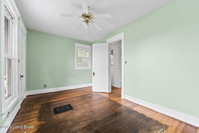 1412 Bluegrass Ave, Louisville, KY 40215 - unfurnished bedroom featuring lofted ceiling, hardwood / wood-style floors, visible vents, a ceiling fan, and baseboards