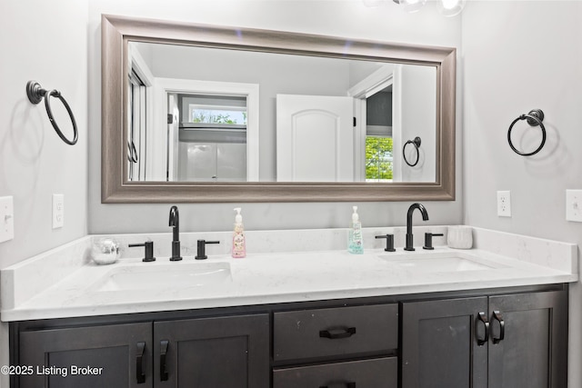 bathroom featuring double vanity