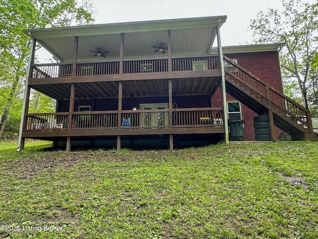 back of house featuring brick siding, stairway, a deck, and a ceiling fan