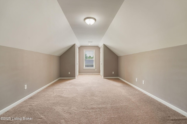 1415 Parkridge Pkwy, Louisville, KY 40214 - additional living space featuring light carpet, lofted ceiling, and baseboards