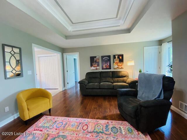 1300 Midway Ln, Springfield, KY 40069 - living area featuring a raised ceiling, wood-type flooring, baseboards, and ornamental molding
