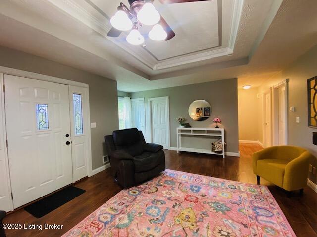 1300 Midway Ln, Springfield, KY 40069 - foyer featuring a raised ceiling, wood finished floors, ornamental molding, and baseboards