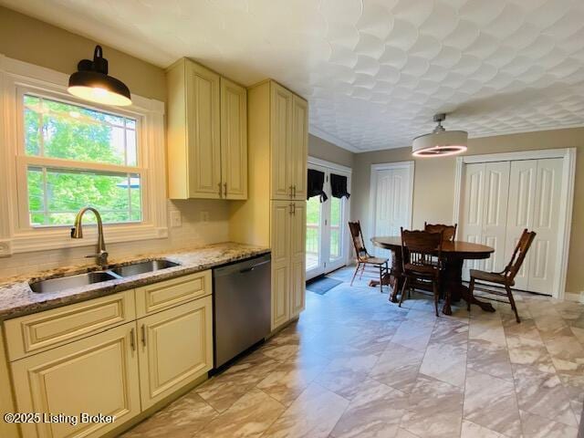 1300 Midway Ln, Springfield, KY 40069 - kitchen featuring stainless steel dishwasher, cream cabinets, a sink, and light stone counters