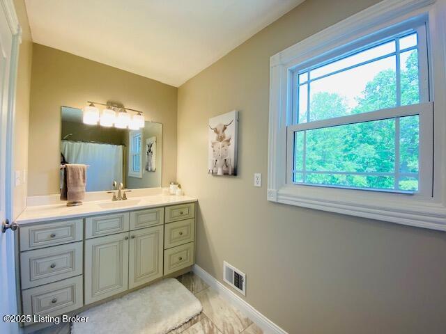 1300 Midway Ln, Springfield, KY 40069 - bathroom featuring vanity, marble look tile flooring, baseboards, and a shower with curtain