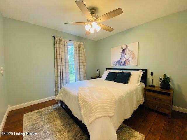1300 Midway Ln, Springfield, KY 40069 - bedroom featuring baseboards, wood finished floors, and a ceiling fan