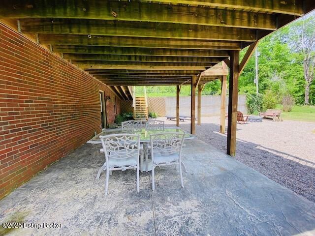 1300 Midway Ln, Springfield, KY 40069 - view of patio / terrace with outdoor dining area and fence