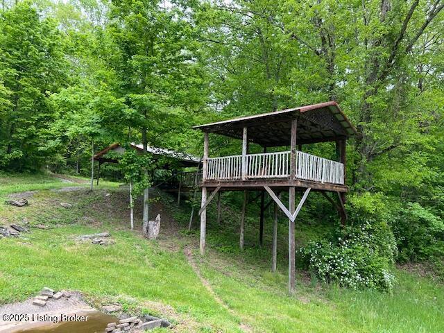 1300 Midway Ln, Springfield, KY 40069 - view of yard featuring a deck and a wooded view