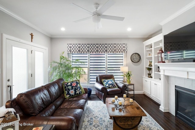 2421 Irish Bend Ct, Fisherville, KY 40023 - living room with recessed lighting, ornamental molding, a tiled fireplace, ceiling fan, and dark wood-type flooring