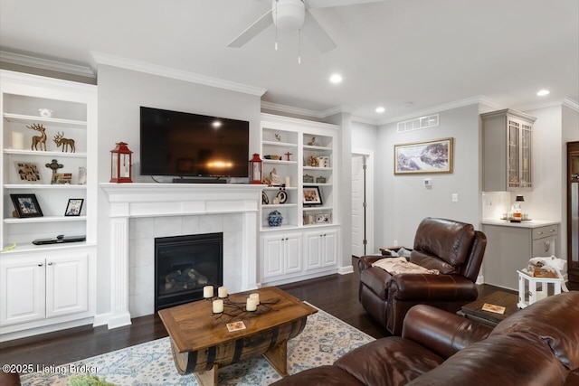 2421 Irish Bend Ct, Fisherville, KY 40023 - living room with a fireplace, visible vents, dark wood-style flooring, ceiling fan, and ornamental molding