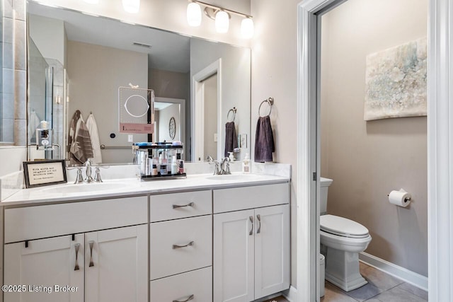 2421 Irish Bend Ct, Fisherville, KY 40023 - full bath with double vanity, toilet, baseboards, and a sink