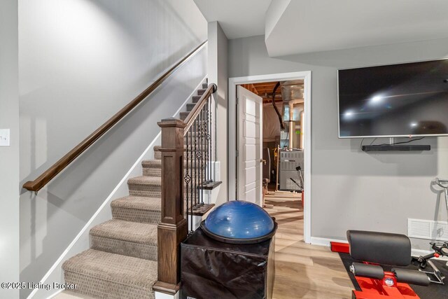 2421 Irish Bend Ct, Fisherville, KY 40023 - workout area featuring light wood-style flooring, baseboards, and visible vents