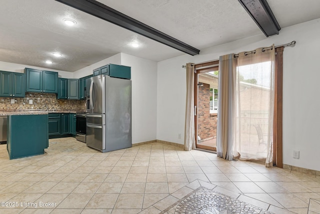 1509 Glenrock Rd, Louisville, KY 40216 - kitchen featuring appliances with stainless steel finishes, beamed ceiling, a textured ceiling, decorative backsplash, and baseboards