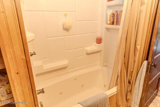 bathroom featuring a combined bath / shower with jetted tub