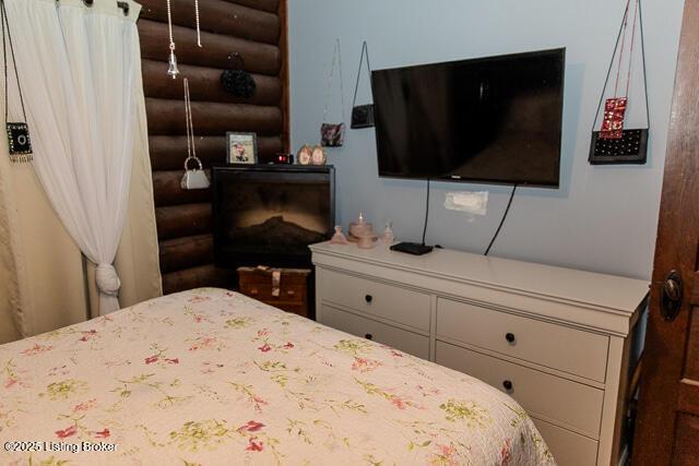 bedroom with rustic walls