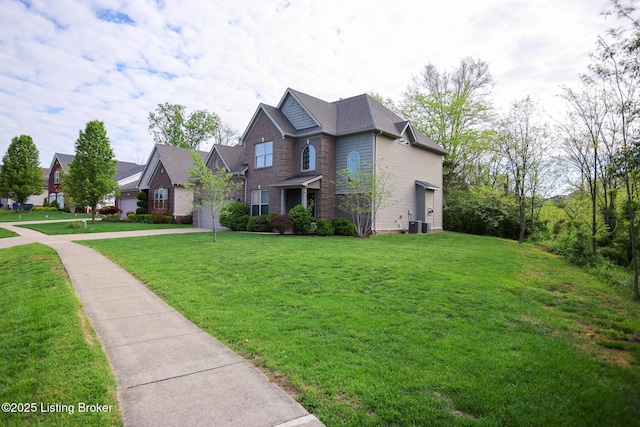 803 Urton Woods Way, Louisville, KY 40243 - traditional-style home featuring a front lawn, an attached garage, brick siding, driveway, and central AC