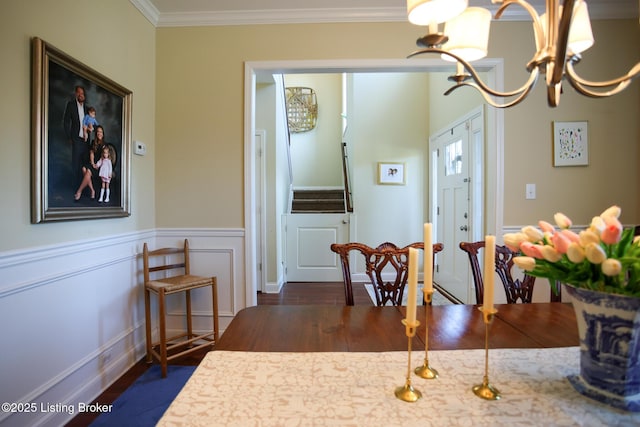 803 Urton Woods Way, Louisville, KY 40243 - dining room with ornamental molding, dark wood finished floors, a chandelier, and a wainscoted wall