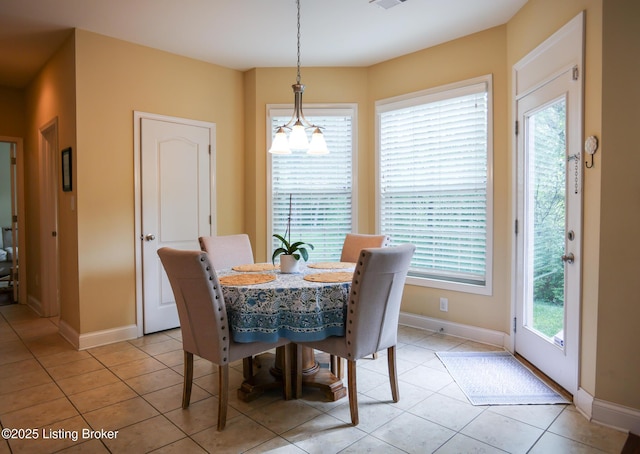 803 Urton Woods Way, Louisville, KY 40243 - dining space featuring light tile patterned floors and baseboards
