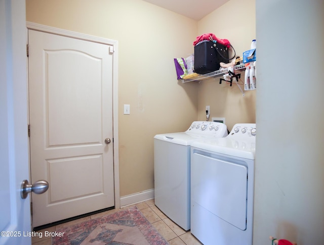 803 Urton Woods Way, Louisville, KY 40243 - clothes washing area with separate washer and dryer, light tile patterned flooring, and baseboards