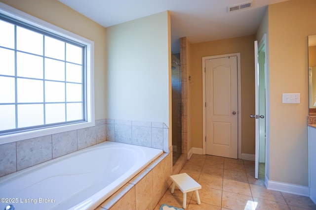 803 Urton Woods Way, Louisville, KY 40243 - full bathroom with a stall shower, a garden tub, tile patterned flooring, and baseboards