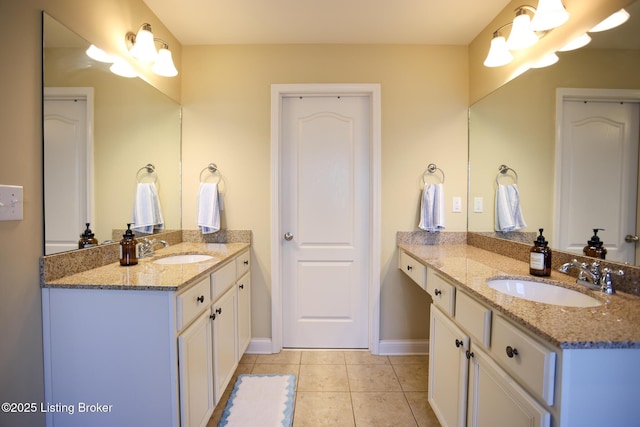 803 Urton Woods Way, Louisville, KY 40243 - bathroom featuring tile patterned flooring, two vanities, and baseboards